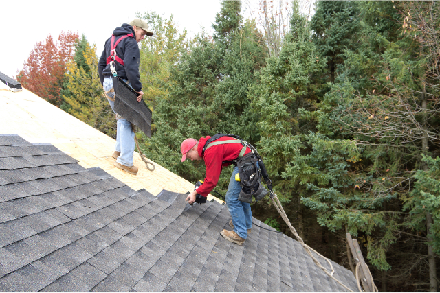 Roofers Installing Asphalt Shingles
